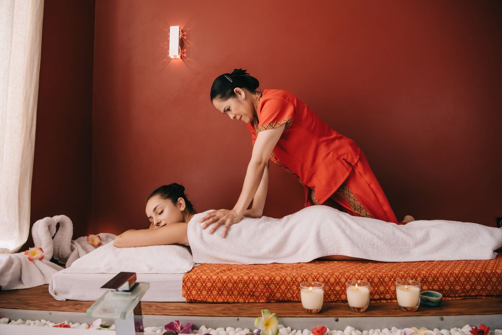 Experience a Thai massage at a spa in Bangkok.